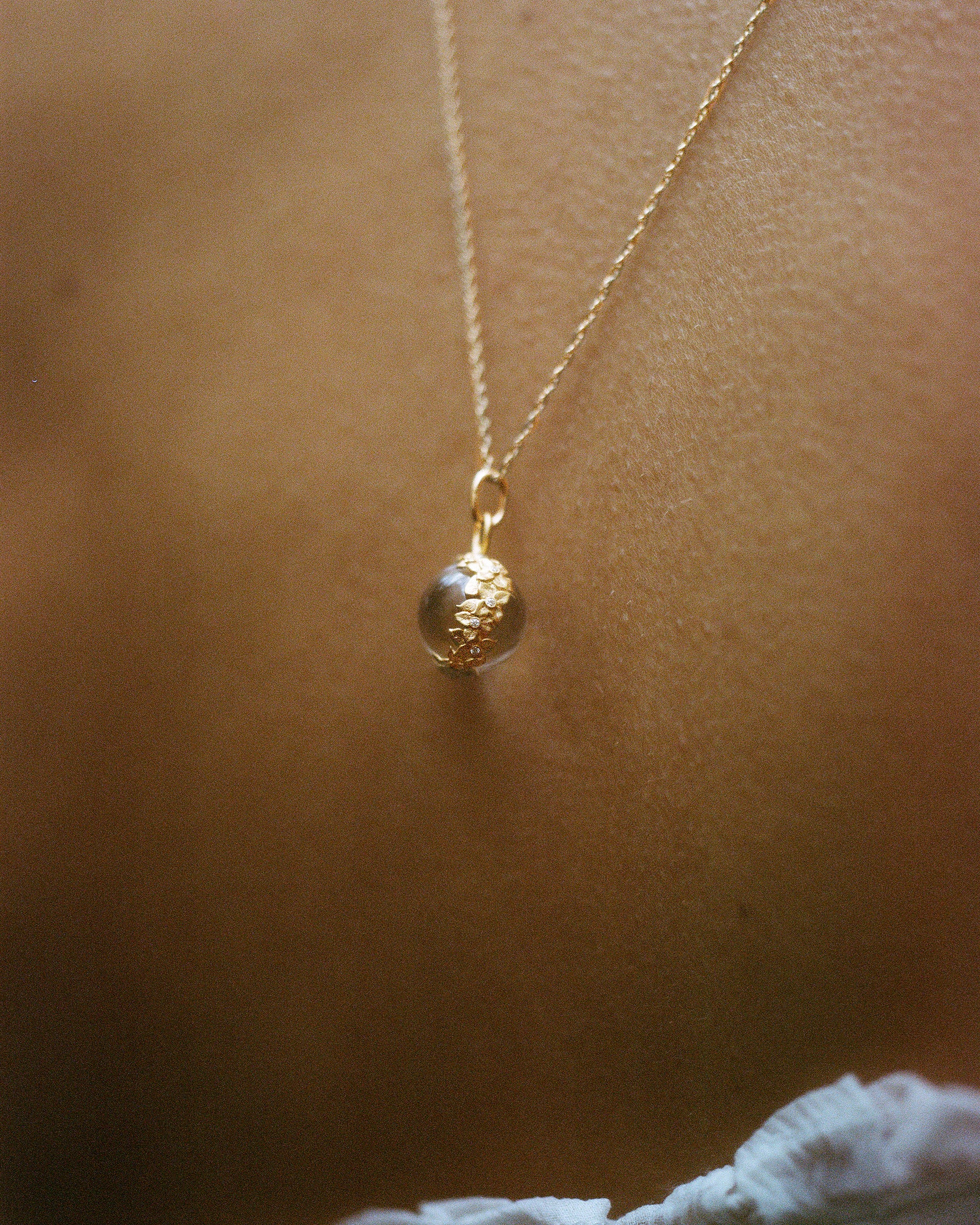 (03) The Garden Pendant in Clear Quartz