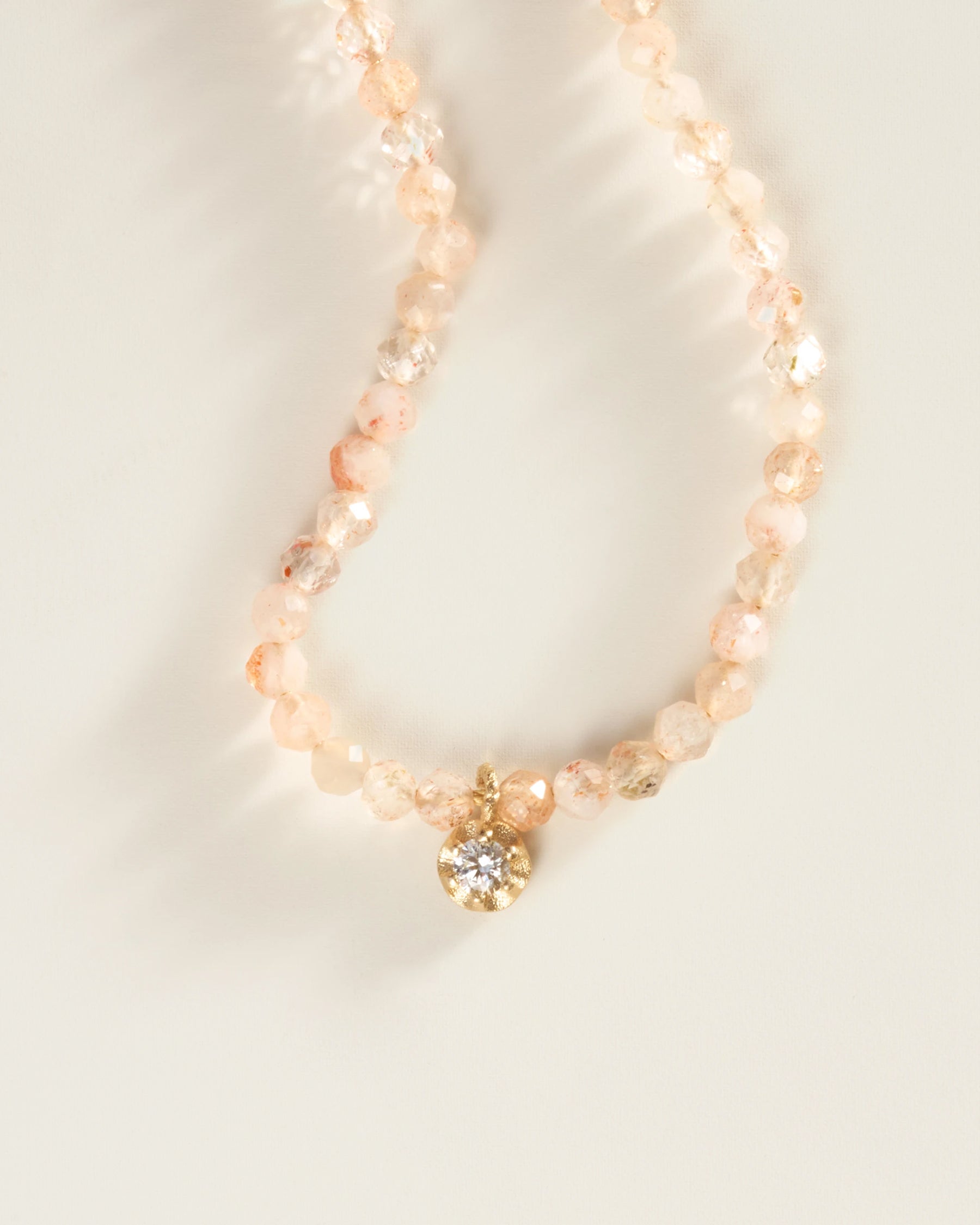 The Amulet Choker in Rose Quartz