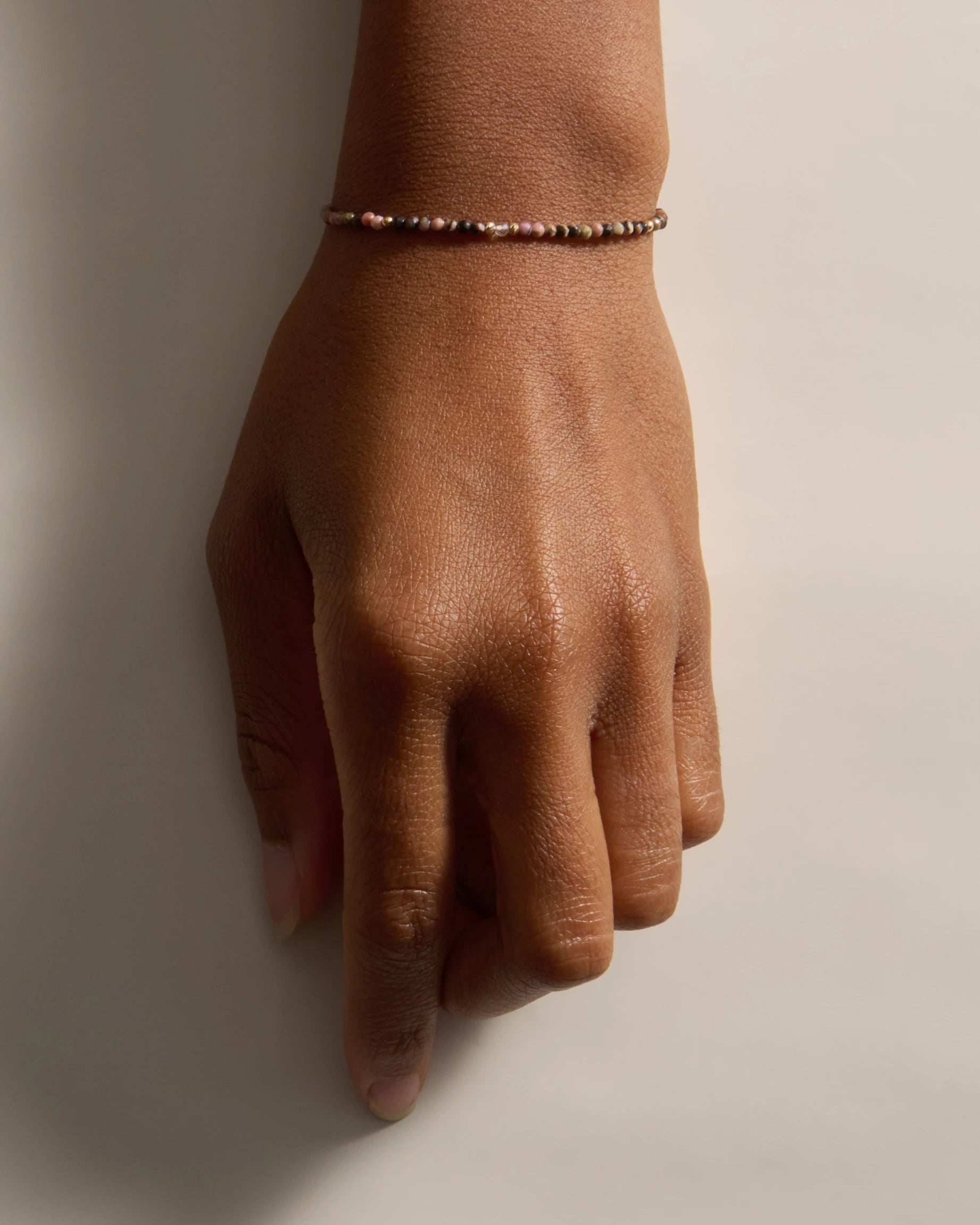 The Crystal Strand Bracelet In Rhodonite — Seeds of Compassion